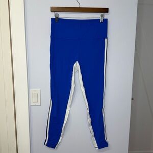 Athleta Ladies Leggings, size M, Royal blue with white/black stripes.  Like new!
